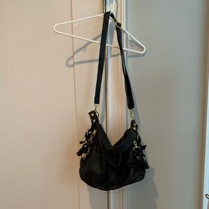 Black oversized slouchy purse with gold hardware